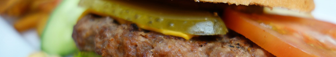 Eating American (Traditional) Burger at Clancy's Irish Pub restaurant in Ellisville, MO.
